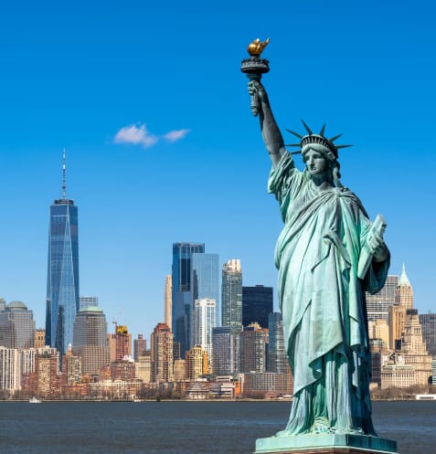 Statue of Liberty and Lower Manhattan skyline representing New York City properties served by PBS
